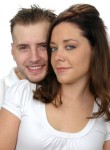 Attractive couple's portrait isolated on a white background